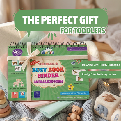 Toddler's Busy Book Binder with educational content on a soft surface with toys around